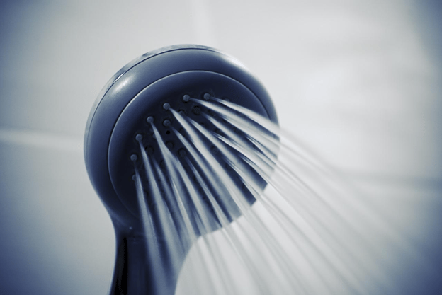 A Shower Head With Water Coming Out