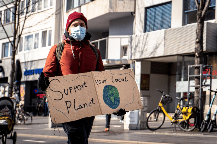 Person holding a sign